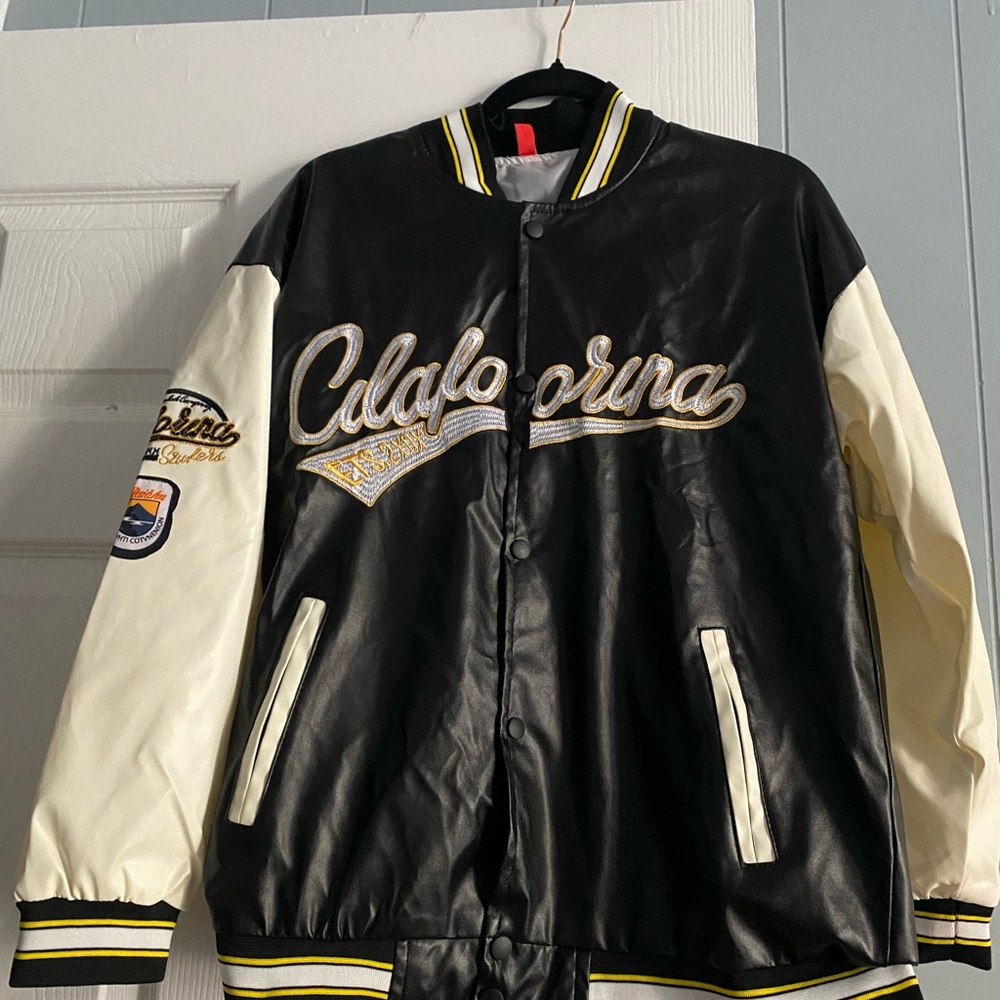 Fo leather car racer jacket feels like rain jacket .